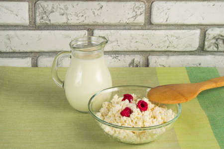 diet cottage cheese with fresh raspberries and milk.