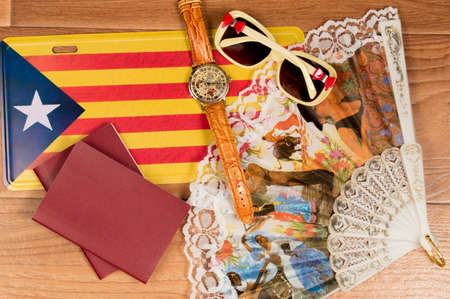 The trip to Catalonia. Copy space. Passports, fan flag watchの写真素材
