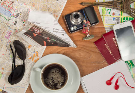 Prepare for travel, documents, maps coffee sunglasses Souvenirs camera.