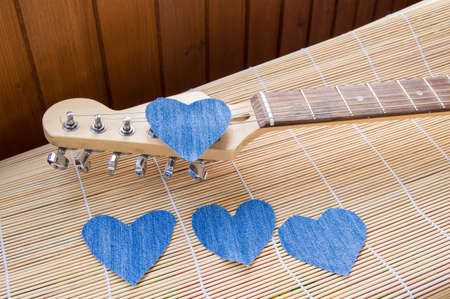 Heart of denim on the guitar. Happy friendship day.の写真素材