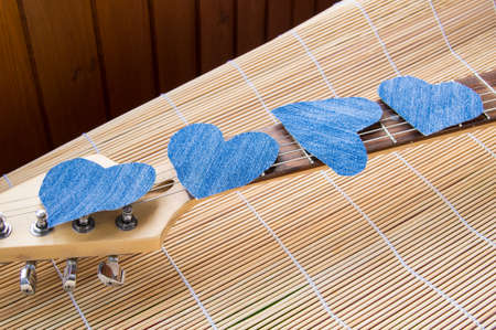 Heart of denim on the guitar. Happy friendship day.の写真素材