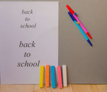 back to school concept, a pen, Notepad chalk