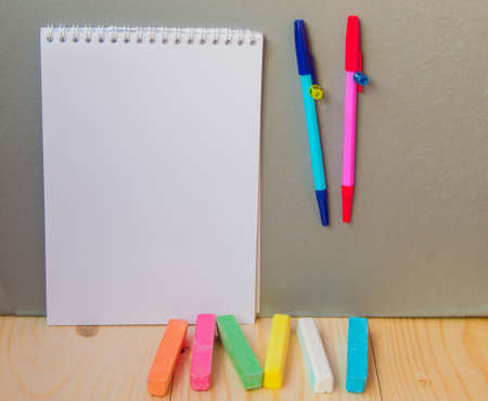 back to school concept, a pen, Notepad chalk