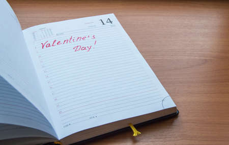 The inscription in the open diary Valentines Dayの写真素材