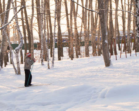 Winter Park cross country skier walks on trailsの写真素材