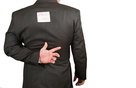 Businessman fools day with a sheet on her back, isolated