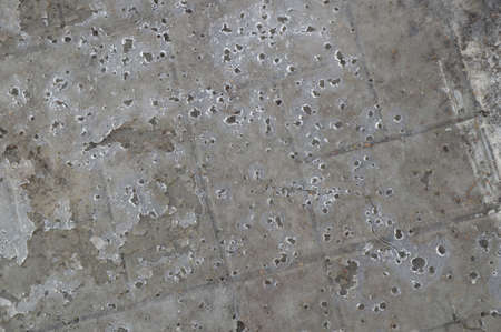 A thin skim of ice on the pavement, spring Background, Abstract imageの写真素材