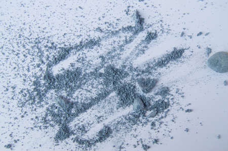 Blue or gray eye shadows, scattered crumbs on white backgroundの写真素材
