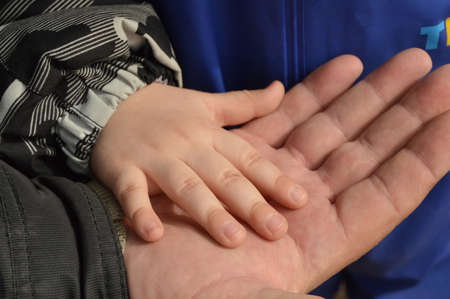 father, grandfather, holding in my hand the handle of a small child, fathers day