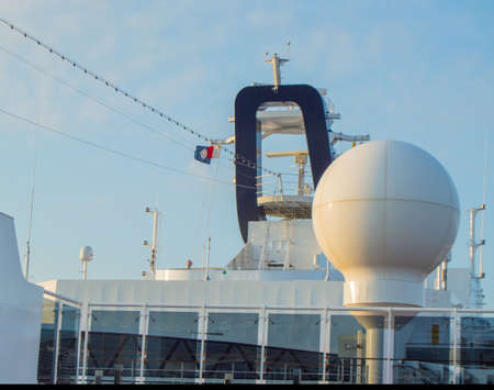 Communication antennas and other electronic equipment on the upper deck of the cruise liner MSC...