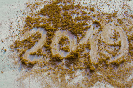 Crushed blush and powder in fashionable bright colors on white background. The inscription 2019.の写真素材