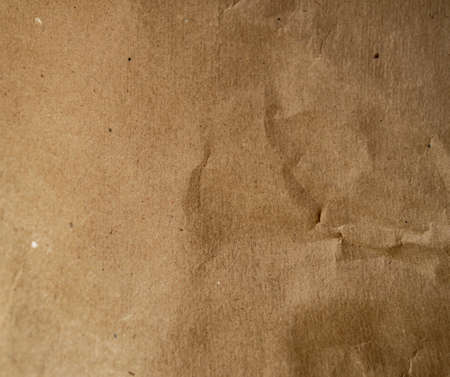 Brown crumpled wrapping paper texture for the background.の写真素材