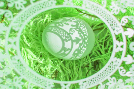 Easter. A beautiful Easter card with an openwork oval frame through which beautiful shadows fall on...