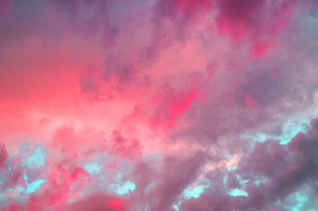 Colorful pastel clouds in the sky at sunset, dramatic clouds after a thunderstorm, the effect of...