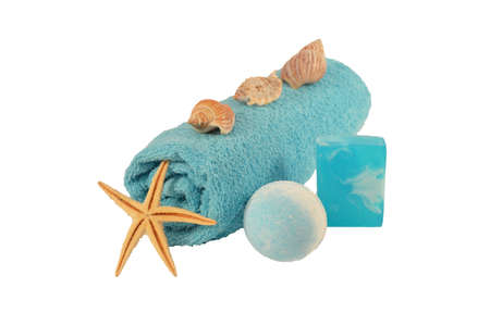 sea salt Spa soap, folded blue towel and star isolated on white background.の写真素材