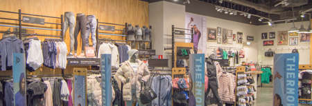 Europolis, Moscow, Russia - October 8, 2019: interior of fashion boutiques with modern clothingのeditorial素材