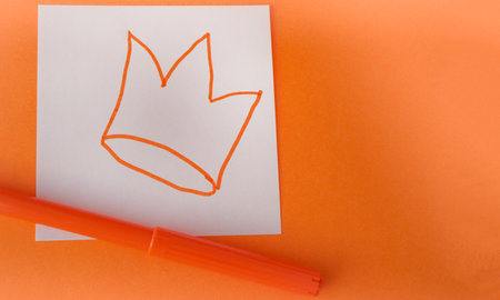 Top view of three multicolored Easter eggs lined up against a background of grass. Flat style, Easter holiday concept.の写真素材
