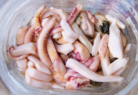 Top view of seafood, ready to eat tentacles and squid, food backgroundの写真素材