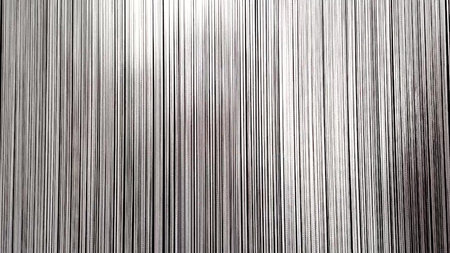 Monochrome vertical light lines interactive installation close up horizontal video soft highlights modern background, copy space nobody ideal for b roll titles presentations and video backdropsの写真素材