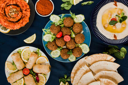 Muhammara, falafel and hummus with pita bread, vegan arabic foodの写真素材