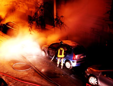 Fire - Burning cars - Fireman at work -