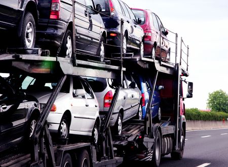 New automobiles on truckの写真素材