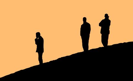 Silhouettes of three man at sunsetの写真素材
