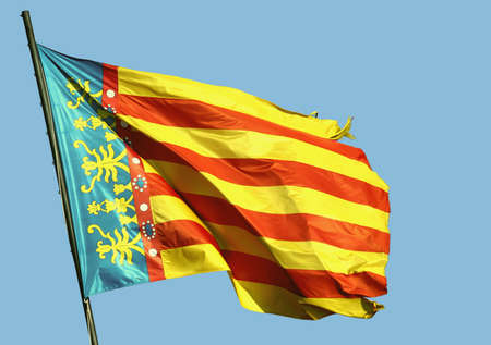 Flag waving in wind, the Castle of Xativa,  Valencia province, Spainの写真素材