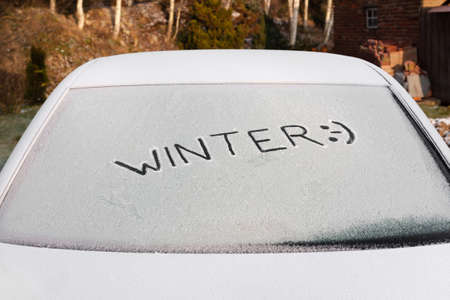 Handwritten inscription Winter on the Ice car rear glass windowの写真素材