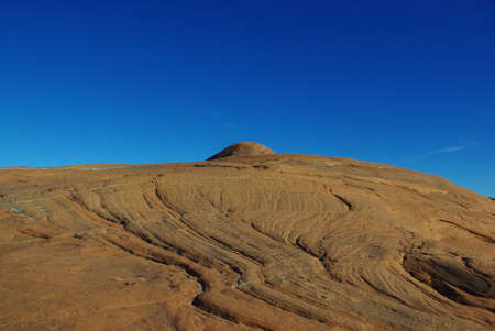 Layered rock under blue sky, Grand Stair Escalante National Monument, Utah