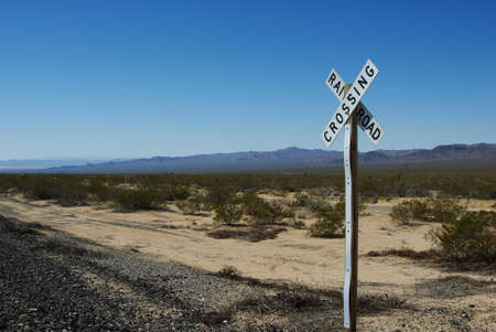 Railway crossing, California desertの写真素材