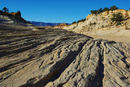 Hiking through a secluded canyon in Utahの写真素材
