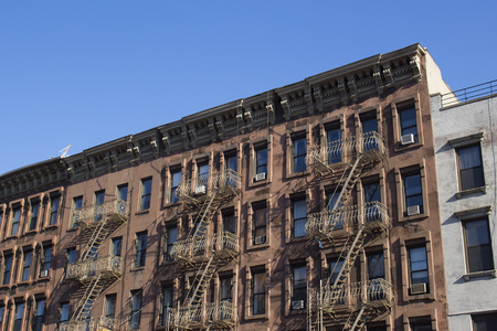 old building with fire stairs in downtown new york cityのeditorial素材