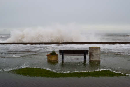Storm surge with a seat to viewの写真素材