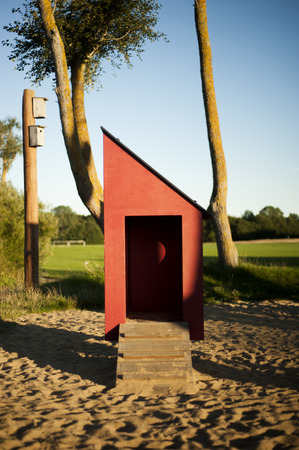kids playground and a red house and some bird house alsoの写真素材