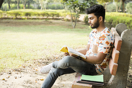 college boy in a parkの写真素材