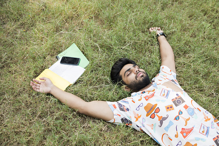 college boy in a parkの写真素材