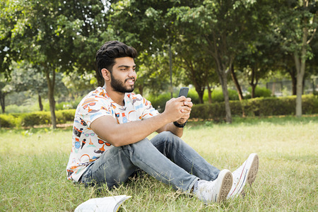 college boy in a parkの写真素材