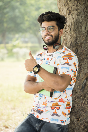 college boy in a parkの写真素材