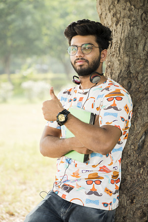college boy in parkの写真素材
