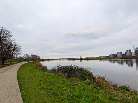 London, UK - 12.16.2021: An empty pathway next to Low Maynard Reservoir in the Walthamstow Wetlands...