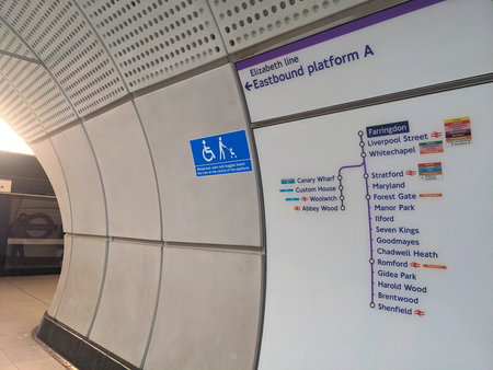 Modern Elizabeth line platform signage and futuristic architecture at Farringdon Station, Londonのeditorial素材