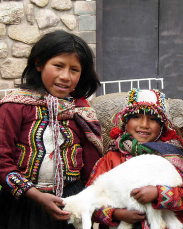 Two peruvian girls with typical colourful costumeのeditorial素材