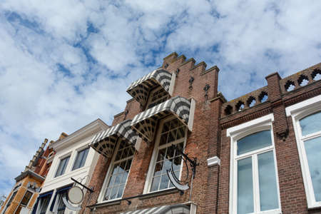 Window on a house in the Netherlands, Zierikzee, with blue skyの写真素材