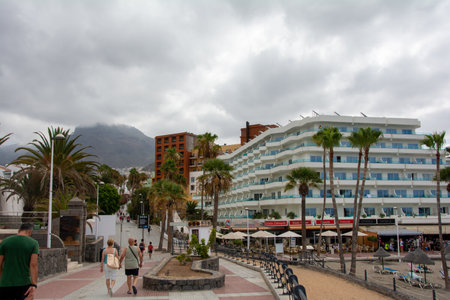 Costa Adeje, Tenerife, Spain Aug 11, 2022 - Beach promenade with street on Canary Islandのeditorial素材