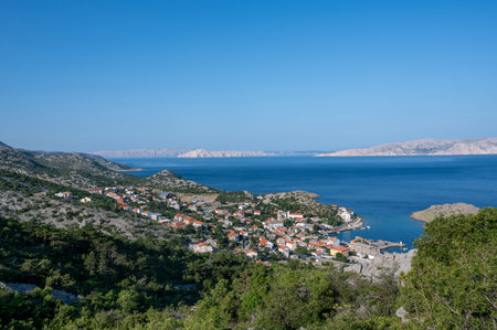 View from above of the small fishing village of Sveti Juraj on the Adriatic coast, at the foot of the Velebit Mountains in Croatia, Europeの写真素材
