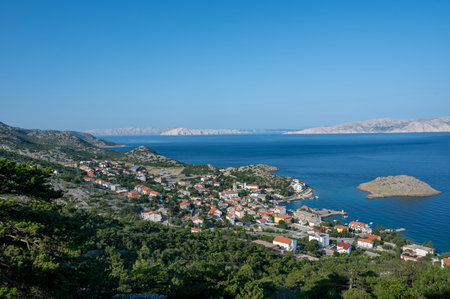 View from above of the small fishing village of Sveti Juraj on the Adriatic coast, at the foot of the Velebit Mountains in Croatia, Europeの写真素材