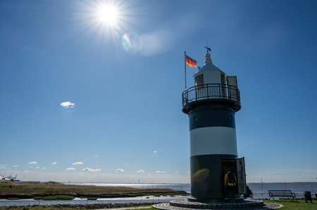 The Little Prussian lighthouse is open to visitors, with a view of the North Sea and bright...