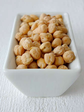 Chickpeas on a plateの写真素材