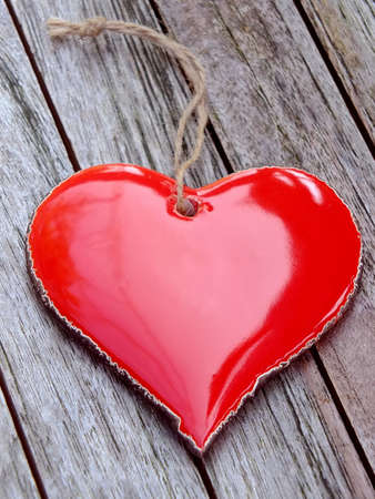 Red heart on wooden backgroundの写真素材